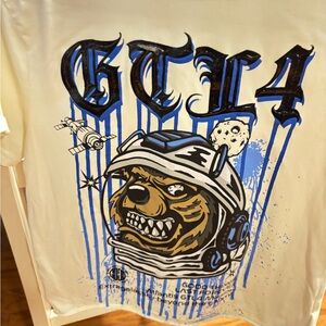 Graphic T-Shirt with Bear and Space Design AND PANTS SIZE 32 SHIRT LARGE.